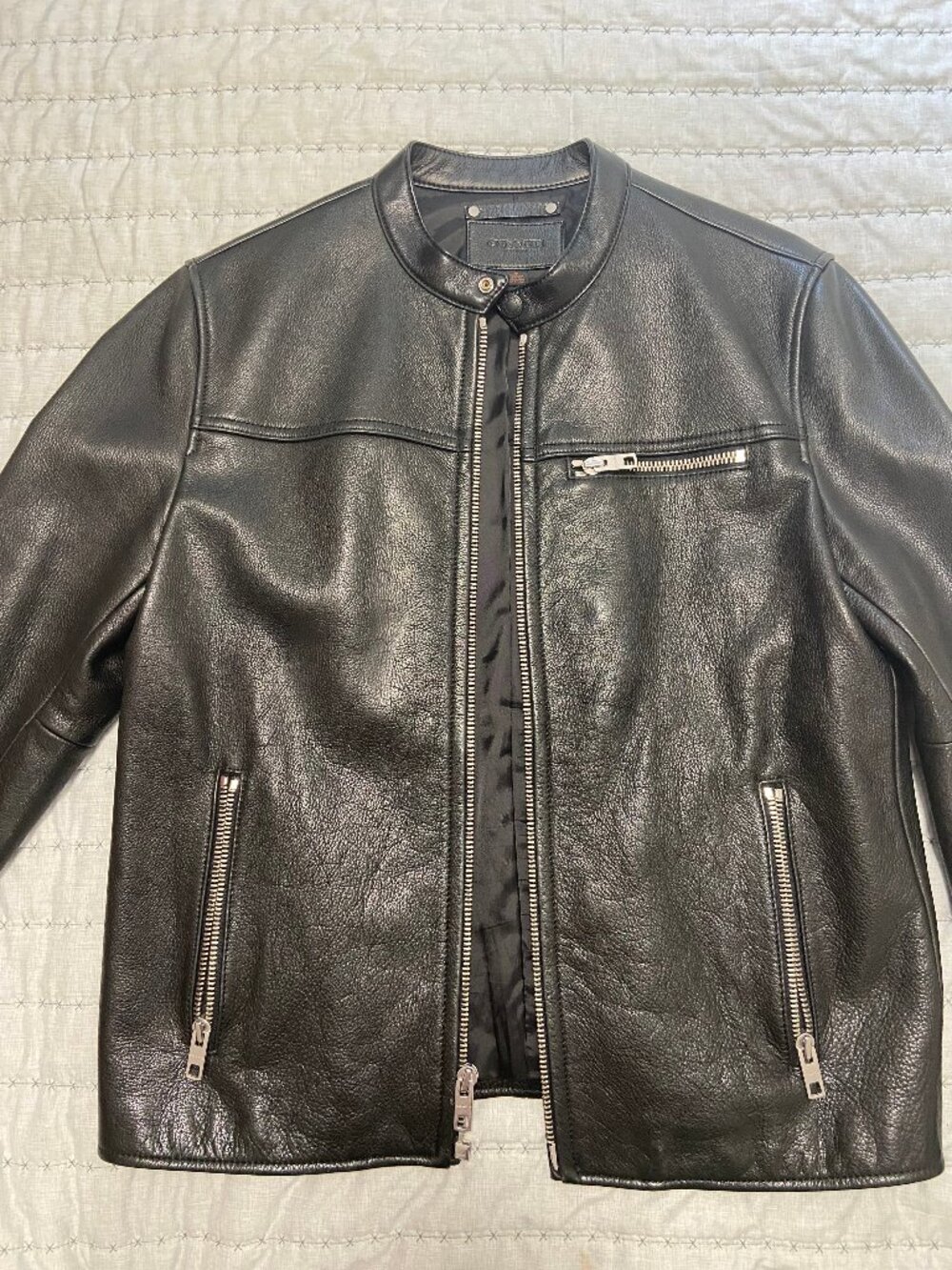 Coach New York men black leather biker jacket in size M
